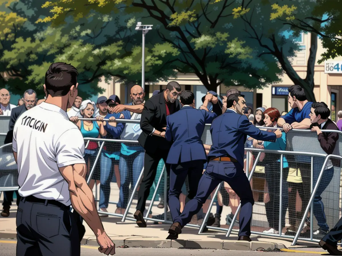 All the bodyguards rush forward, no one holds the shot Prime Minister (left in the picture)