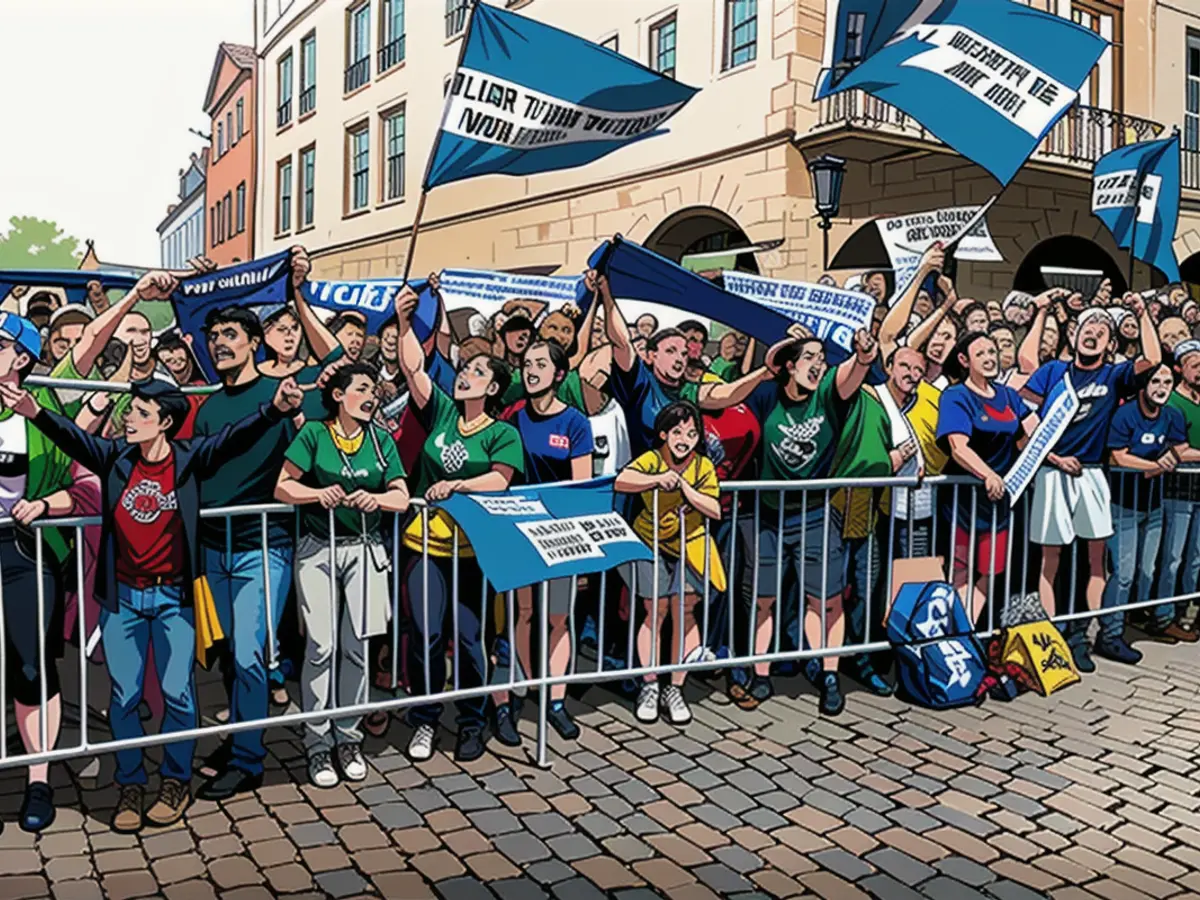 The Prussia fans stood close together on the Prinzipalmarkt and cheered on their promotion heroes