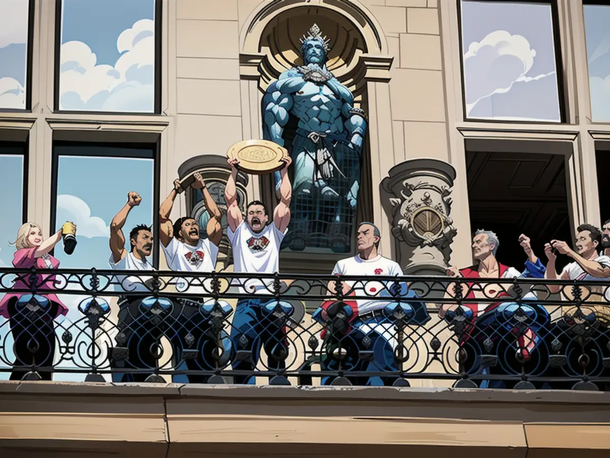 Moment spontané : St. Pauli a investi le balcon gauche de l'hôtel de ville. Karol Mets montre aux...
