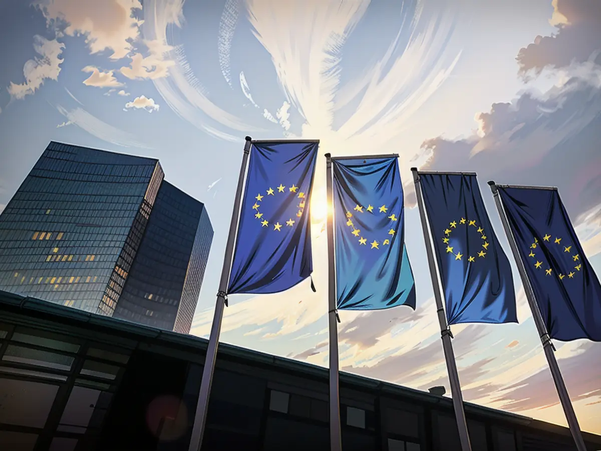 European Union flags fly in front of the European Central Bank in Frankfurt, earlier this year. While EU leaders agree that more money should go to arming Ukraine, there have been divisions over how to finance it.