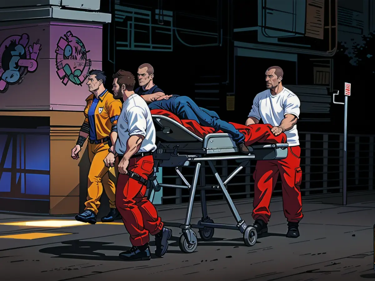 Rescue workers transport the injured man away