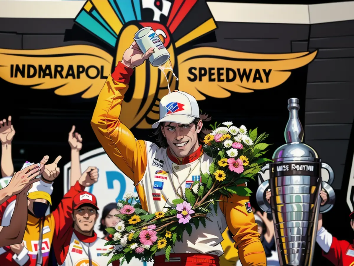 Newgarden douses himself in milk after winning the Indy 500 in 2023.
