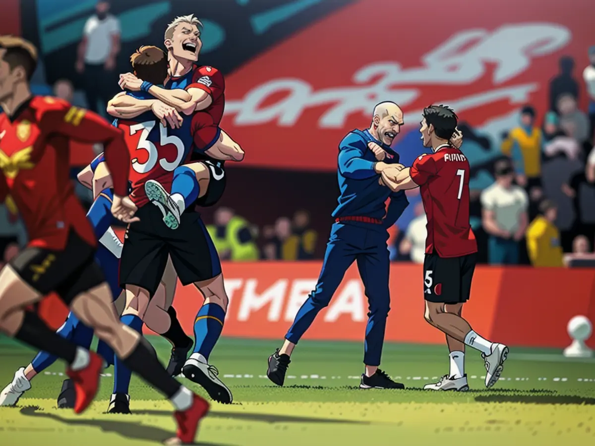 Erik ten Hag celebrates with his players after winning the FA Cup.