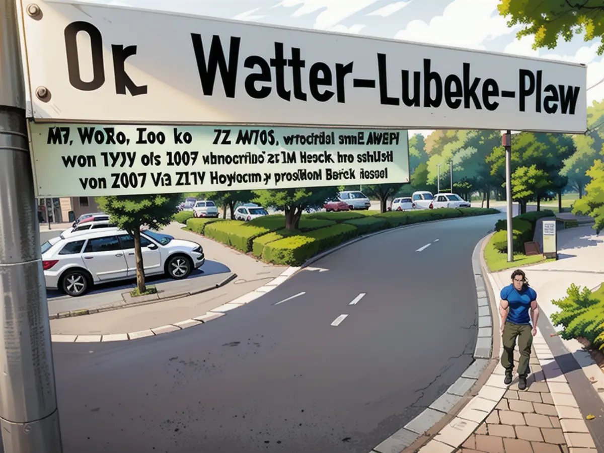 Une plaque de rue portant l'inscription "Dr.-Walter-Lübcke-Platz" se trouve devant la mairie de la...