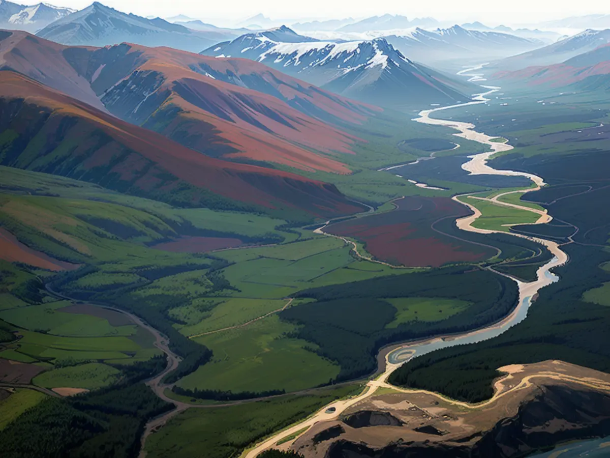 An aerial view of the Kutuk River in Alaska’s Gates of the Arctic National Park, where a portionof the water is rust-stained.