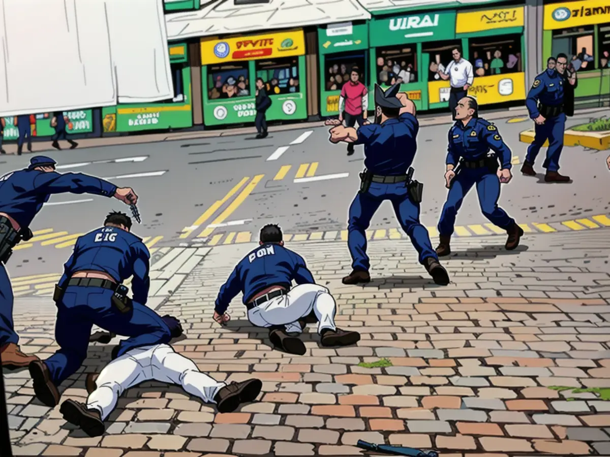 The knifeman rams the blade into the policeman's head from behind, moments later his colleague shoots the attacker down