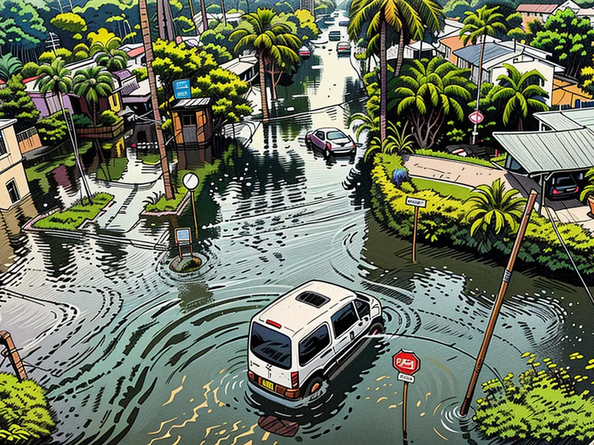 Ein Fahrzeug wird am Donnerstag durch eine überflutete Straße in Hallandale Beach, Florida, gefahren.