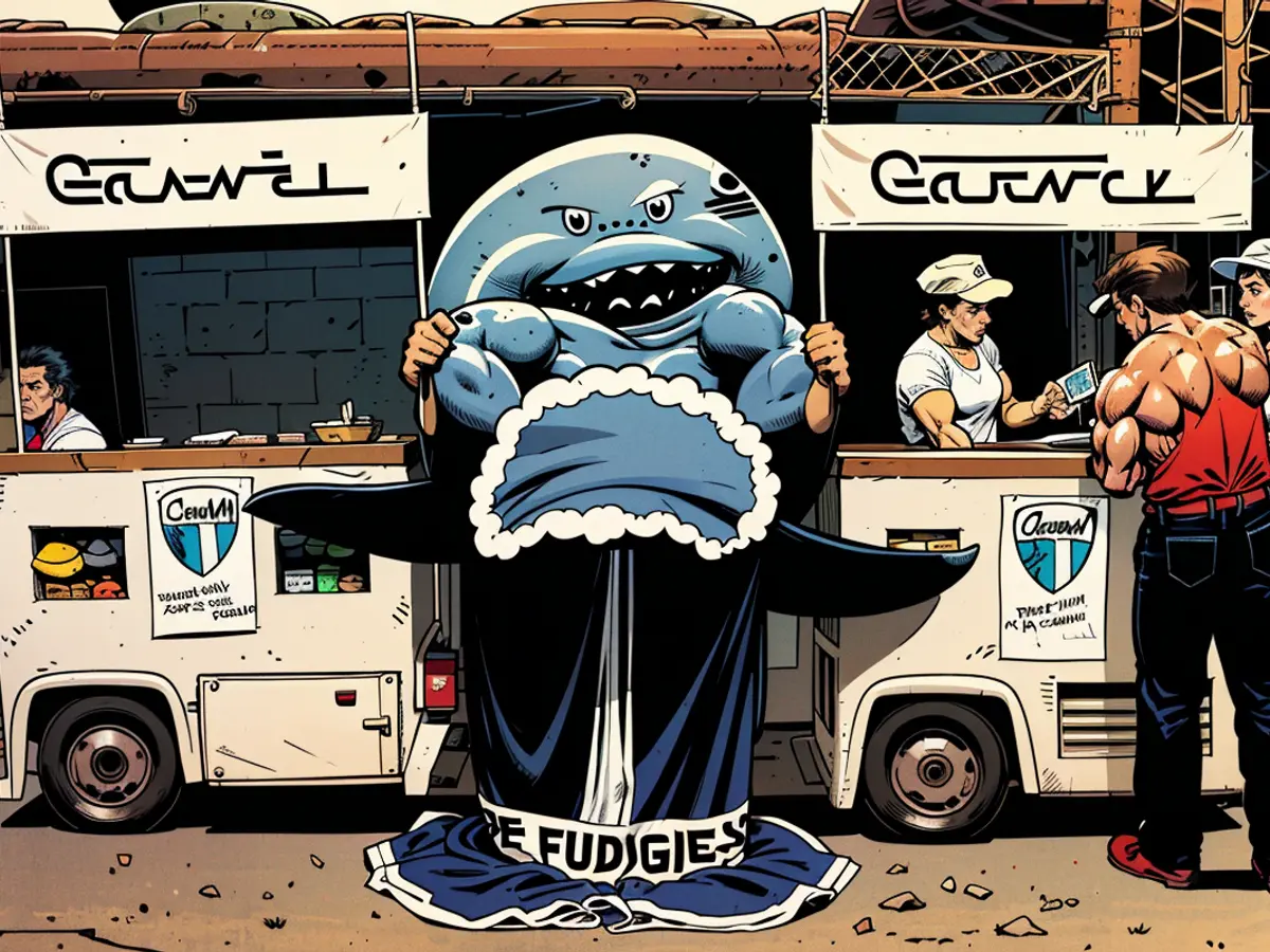 La prima iterazione della mascotte Fudgie the Whale.