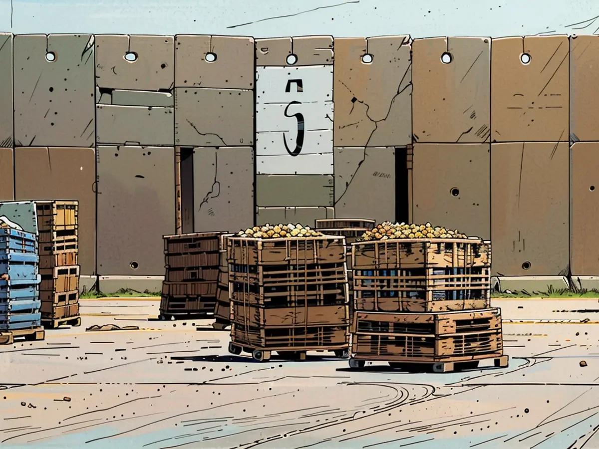 Crates of onions await delivery into Gaza at the Kerem Shalom crossing in southern Israel on Monday.