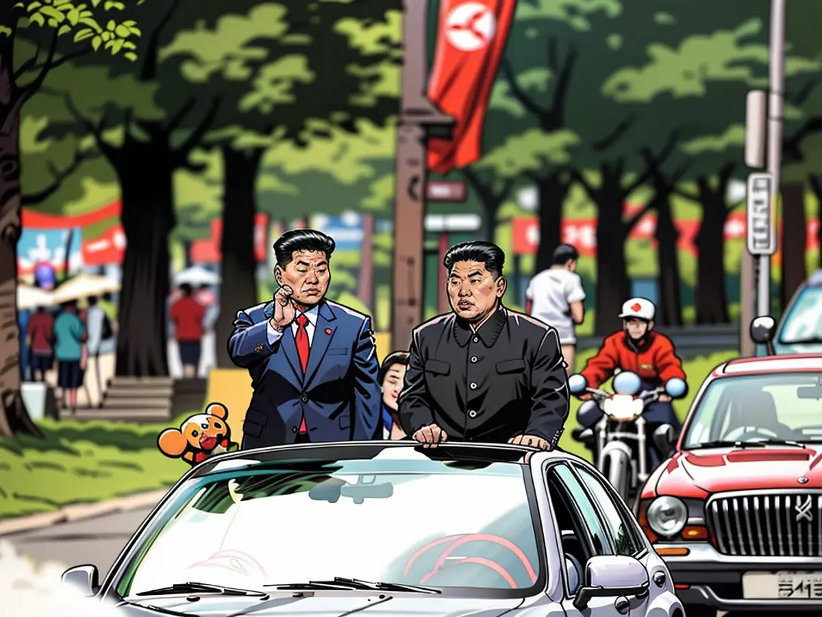 Kim Jong Un emmène le dirigeant chinois Xi Jinping en promenade dans les rues de Pyongyang, en Corée du Nord, le 21 juin 2019.