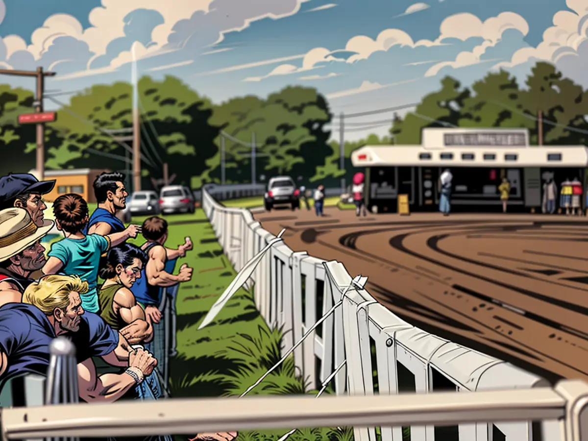 Des spectateurs regardent une course de chevaux dans le Nebraska à l'hippodrome de Columbus en...