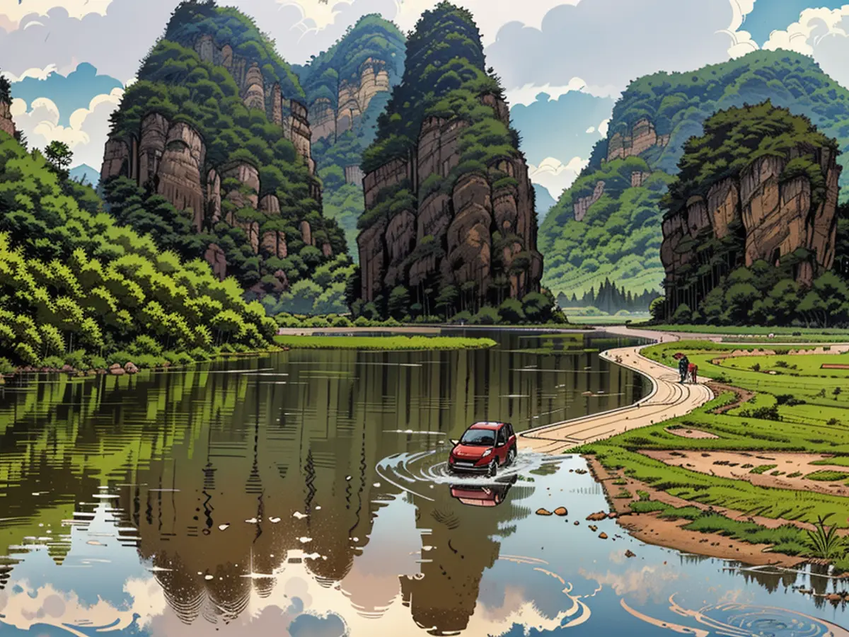 Le acque alluvionali immergono una strada rurale a Chongzuo, nel sud della Cina, il 23 giugno 2024.