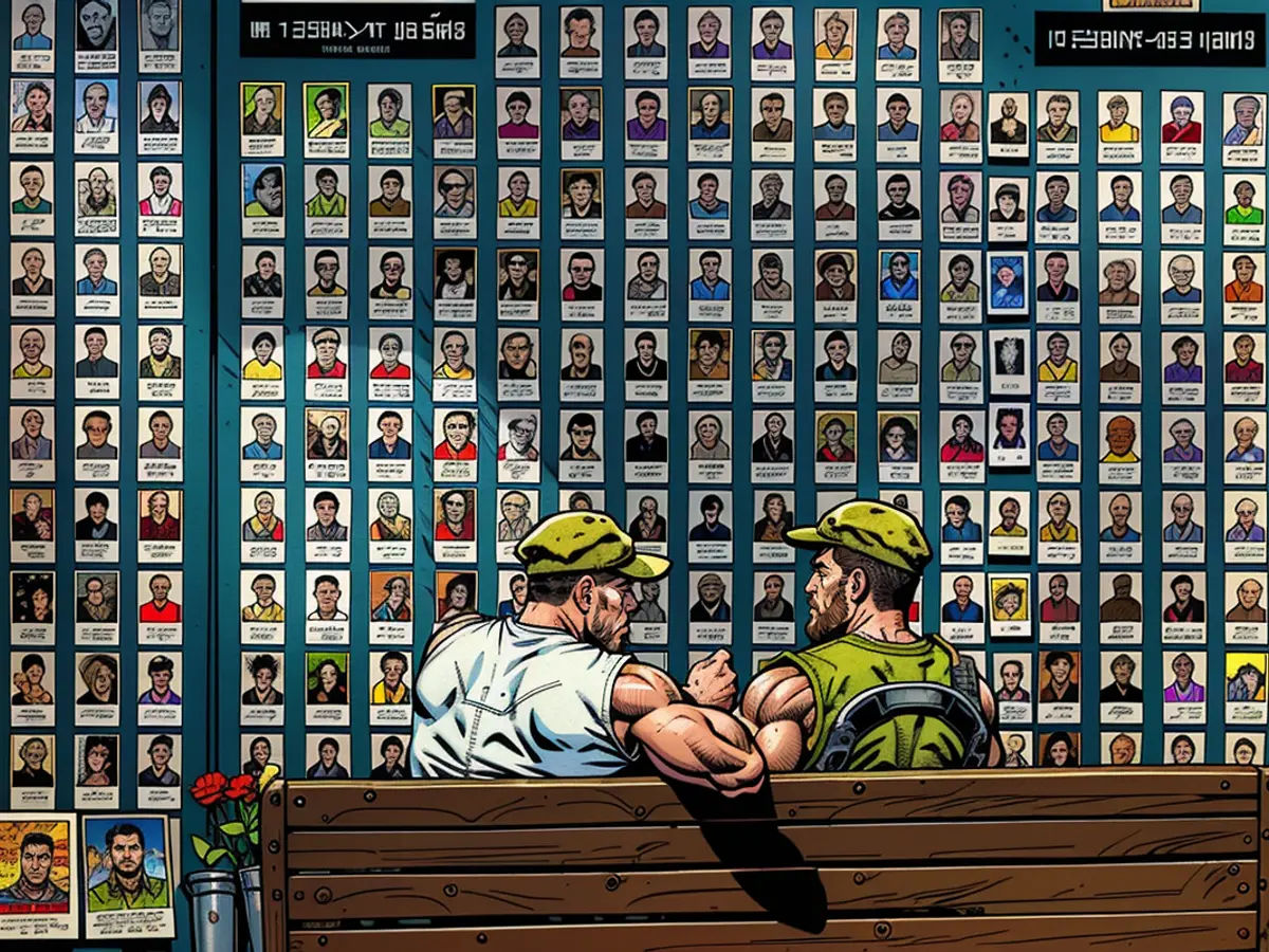 Le Mur du souvenir des morts pour l'Ukraine, au centre de Kiev, qui porte les photographies des soldats tués pendant le conflit.