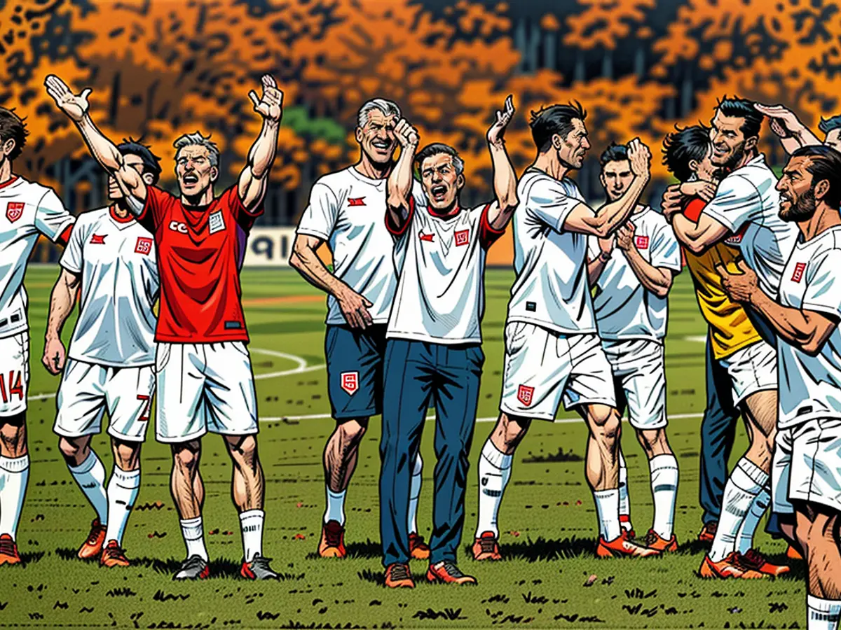 Austria coach Ralf Rangnick and players celebrate after beating the Netherlands.