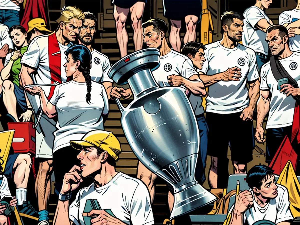 La main sur le but : les supporters allemands transportent le trophée du Championnat d'Europe XXL dans le stade de Dortmund