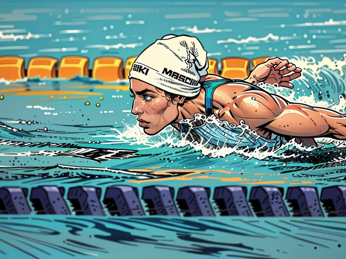 Yusra Mardini competes in the heats for the 100m butterly at the 2020 Olympics in Tokyo.