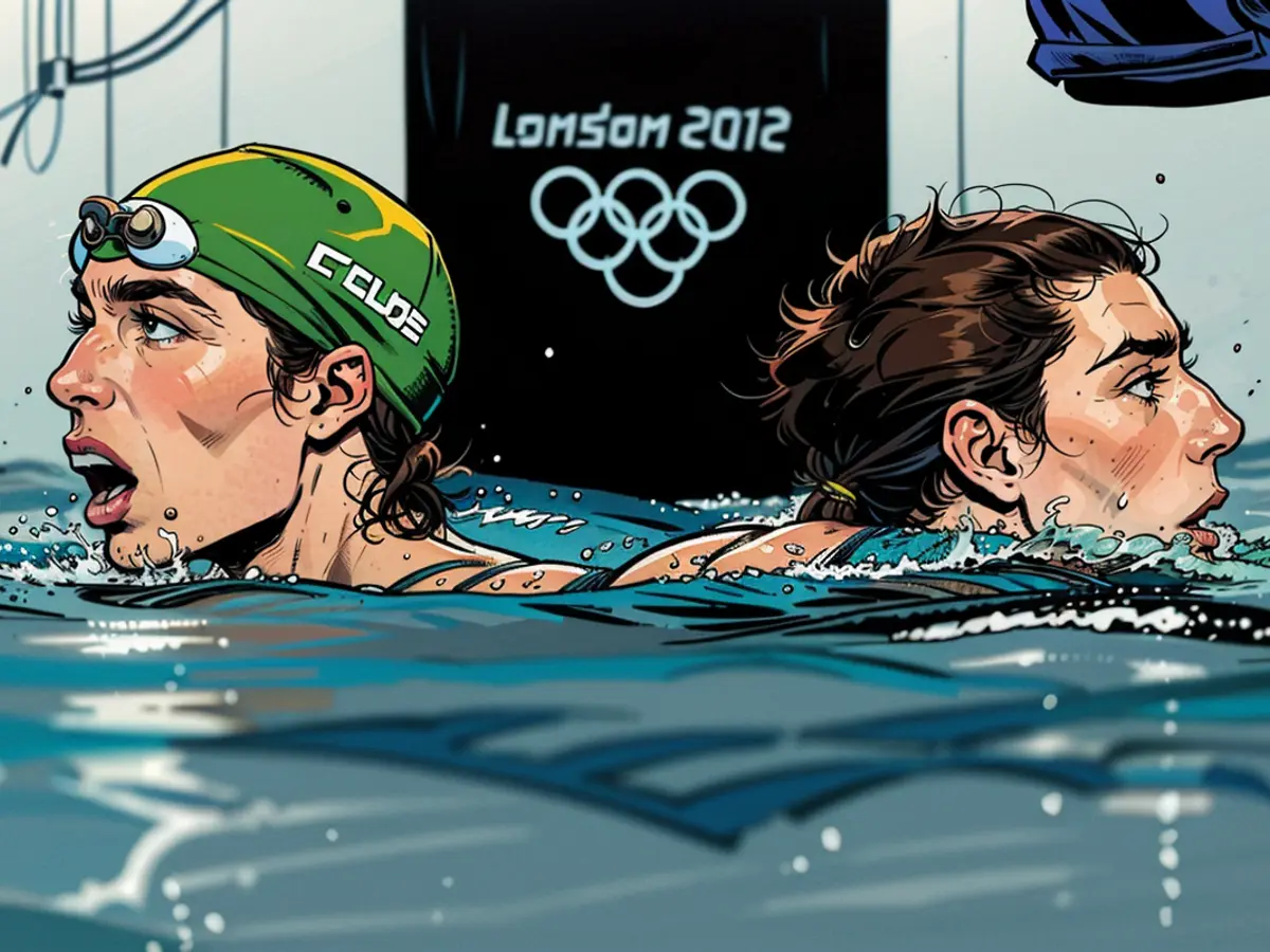Su sudafricano Chad Le Clos (sinistra) reagisce dopo aver vinto la finale dei 200m farfalla maschili accanto al nuotatore statunitense Michael Phelps (destra) durante gli eventi di nuoto alle Olimpiade di Londra 2012 il 31 luglio 2012 a Londra. AFP