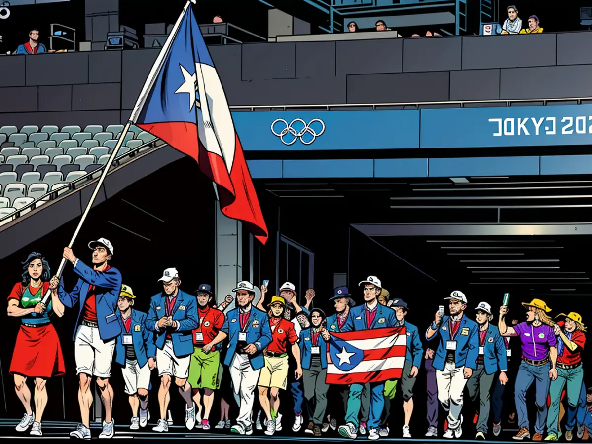 Flag bearers Adriana Díaz and Brian Afanador of Team Puerto Rico walk their team out during the opening ceremony at the Tokyo 2020 Olympic Games.