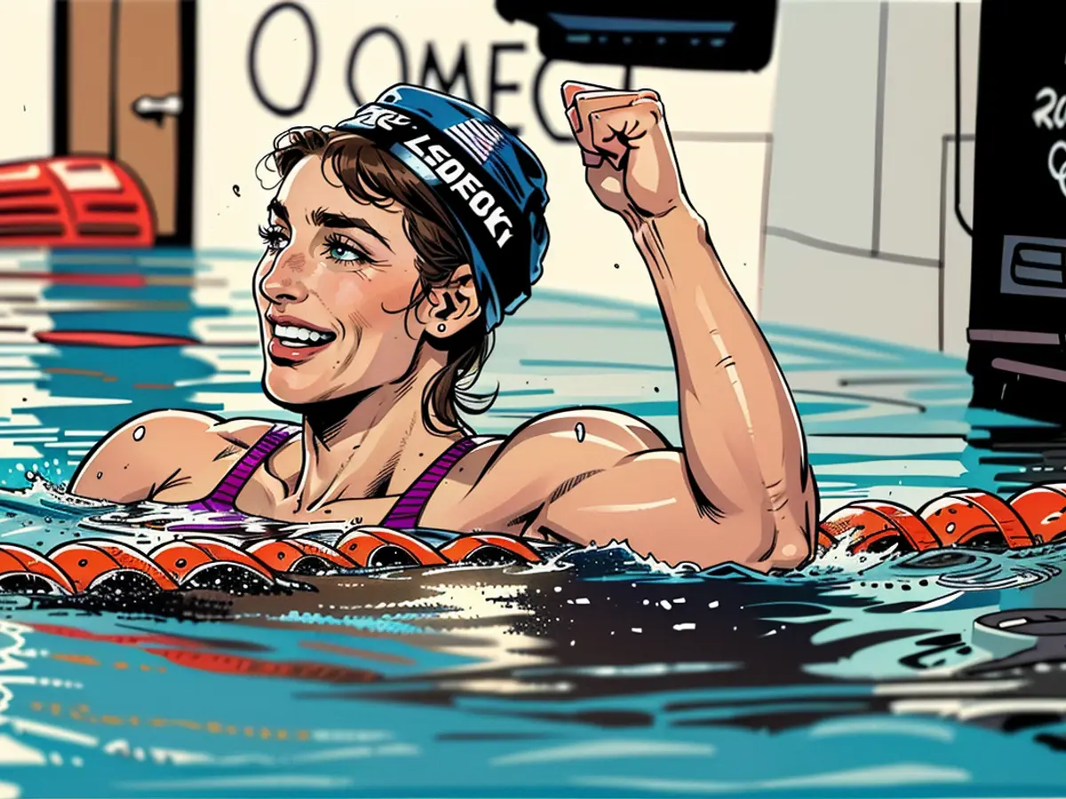 Katie Ledecky fête après avoir battu le record du monde et remporté la finale des 800m nage libre féminin aux Jeux Olympiques de Rio 2016.