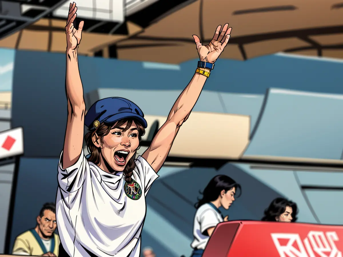 TOPSHOT - Coco Yoshizawa, giapponese di Japan, celebra la vittoria nella finale donne di skateboard street alle Olimpiadi di Parigi 2024 a La Concorde a Parigi il 28 luglio 2024.