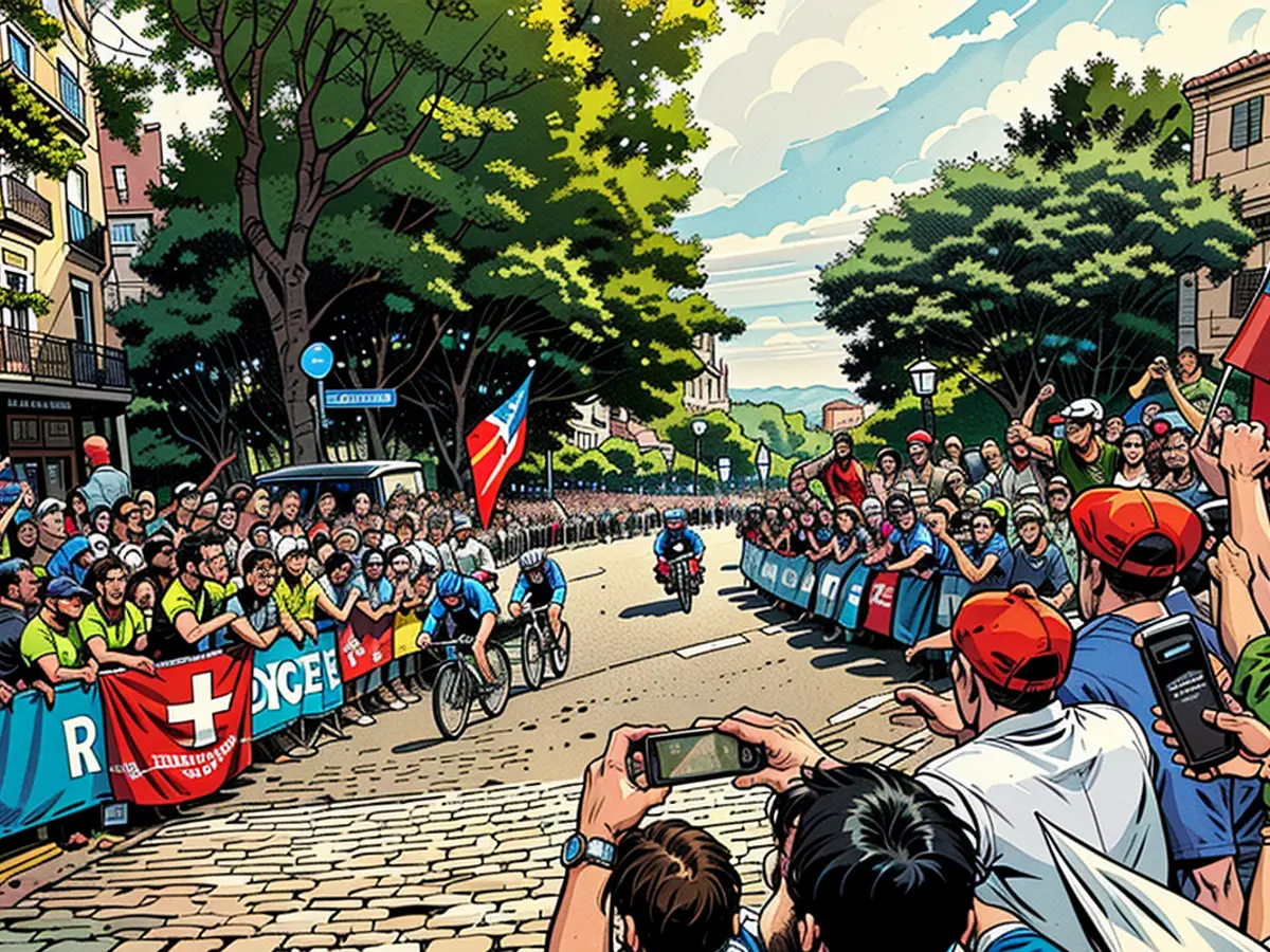 Evenepoel and Valenton Madouas of Team France pass through the Côte de la Butte Montmartre while fans cheers during the men's road race.