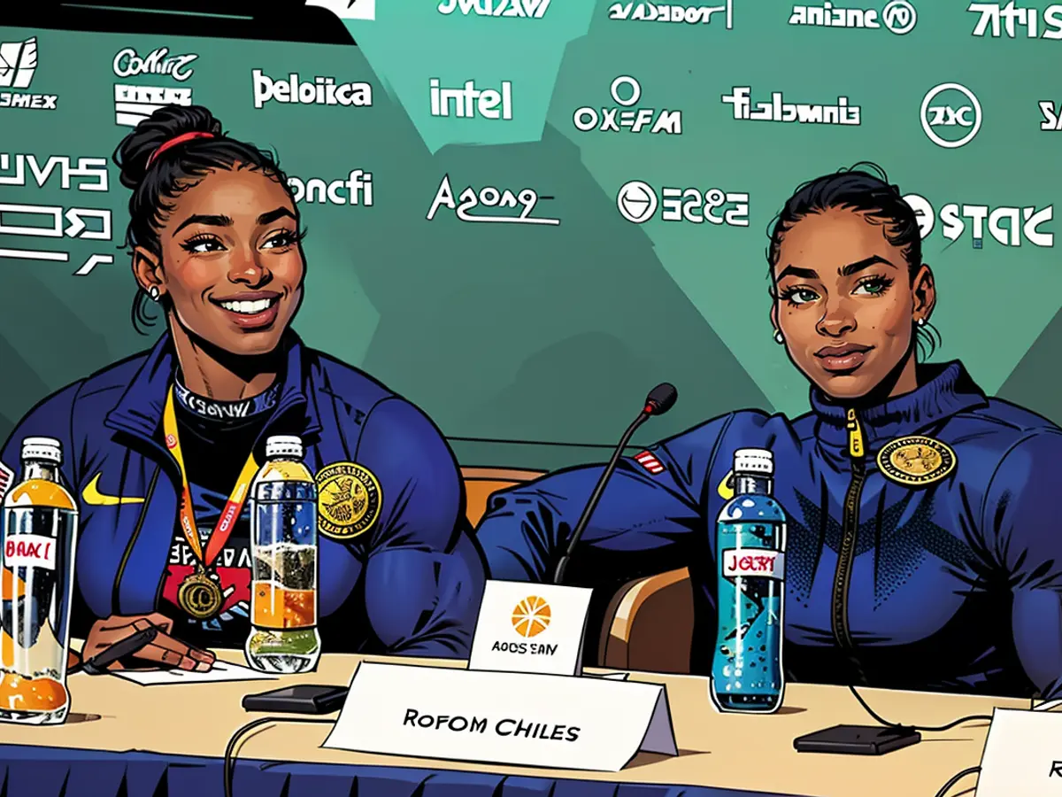 Simone Biles und Jordan Chiles auf dem Podium gehen viral. Die amerikanischen Gymnastik-Stars Simone Biles und Jordan Chiles ehren Rebeca Andrade, nachdem diese beide bei den Olympischen Spielen besiegt und die Goldmedaille im Bodenfinale für Brasilien gewonnen hat.