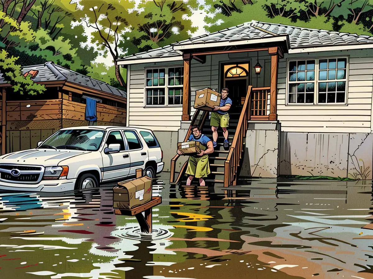 First responders in Savannah, Georgia, carry food Tuesday to residents that were stranded in stormwater from Tropical Storm Debby. (AP 