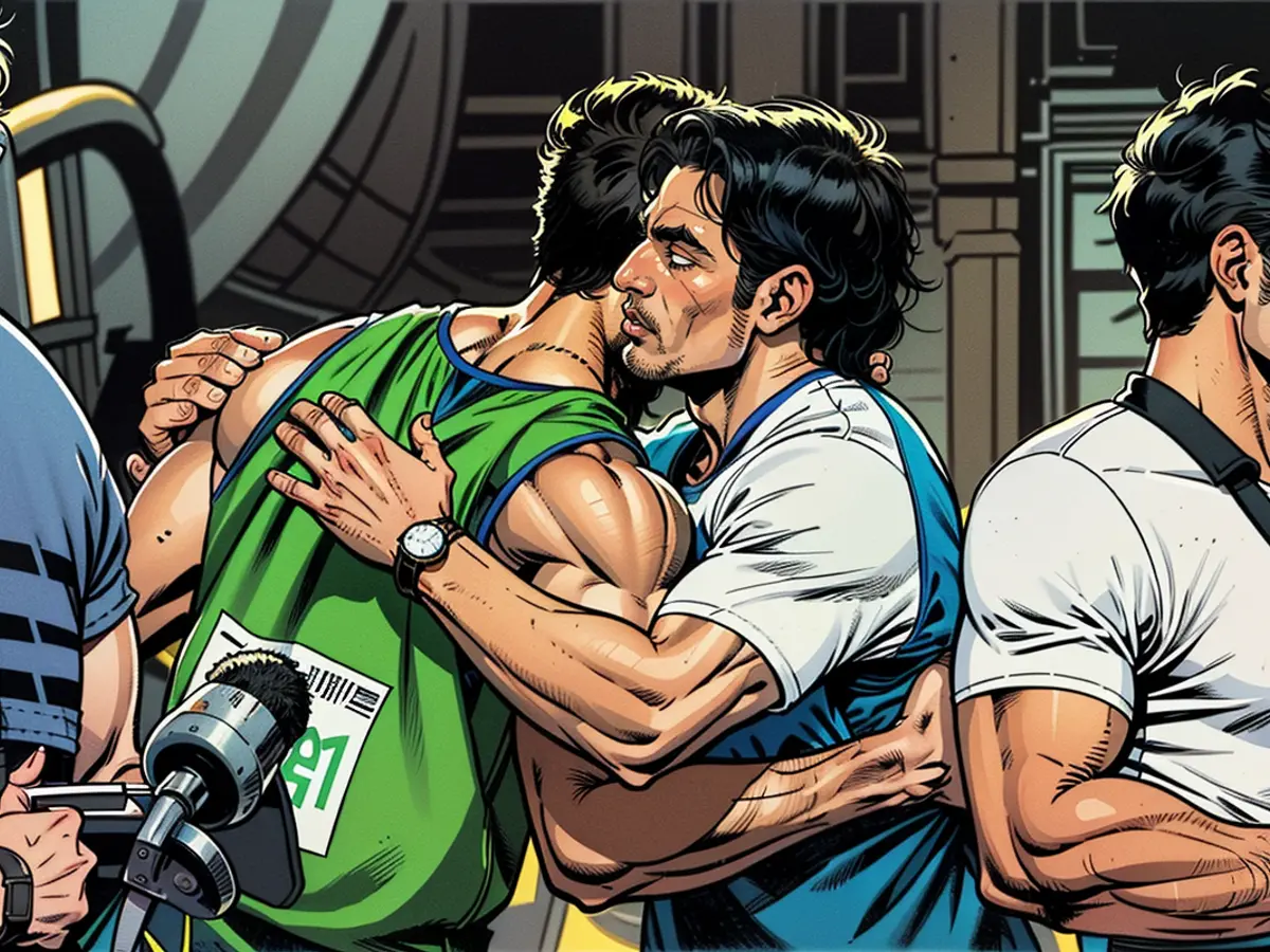 Arshad Nadeem of Pakistan and Neeraj Chopra of India embrace after their gold-silver medal finish at the 2024 Summer Olympic Games.