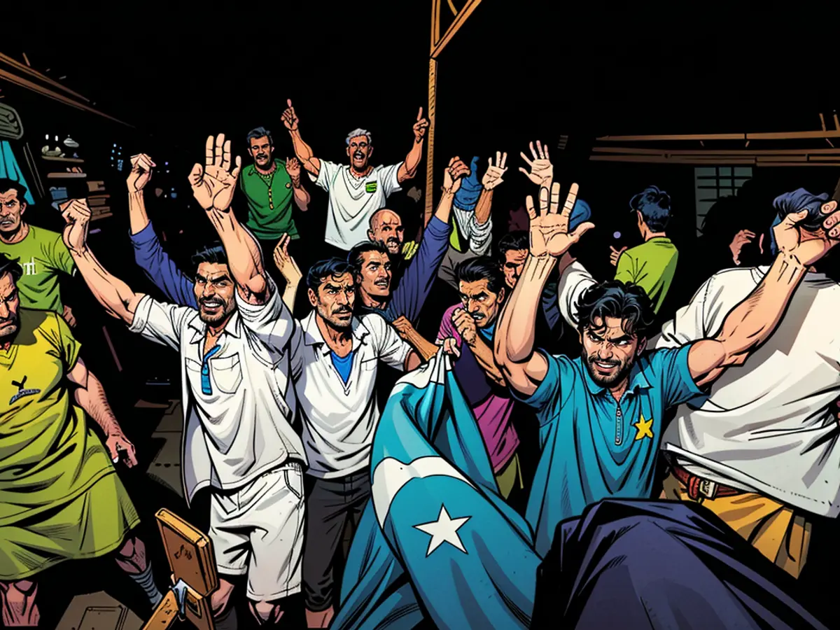 Supporters and family members of Pakistani athlete Arshad Nadeem celebrate after his Olympic victory at Mian Channu in Khanewal district, Pakistan on August 9, 2024.