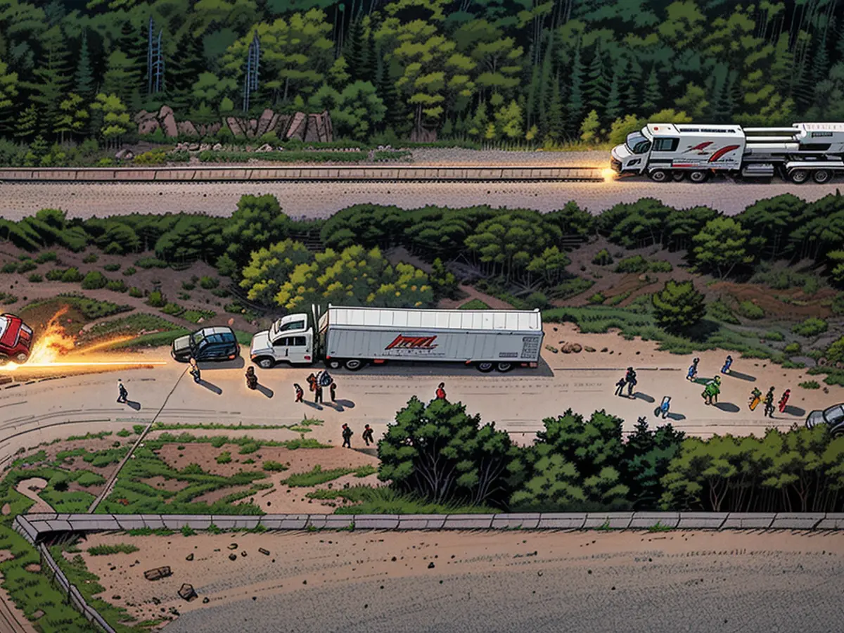 Over this aerial perspective, officials in law enforcement are scrutinizing a cargo truck on June 27, 2022, in San Antonio, Texas.