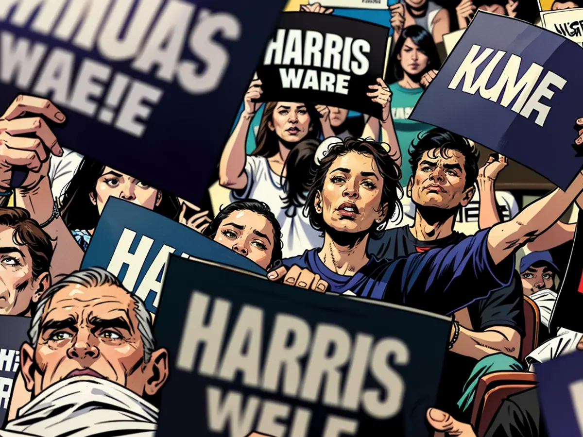 Individuals advocating for Vice President Kamala Harris wave their banners during a political gathering at the University of Las Vegas's Thomas & Mack Center on August 10, situated in Las Vegas.