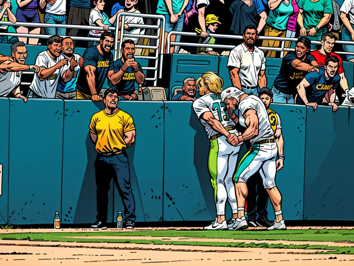 In the third quarter, Hill and Waddle rejoice over Hill scoring a touchdown against the Jacksonville Jaguars.