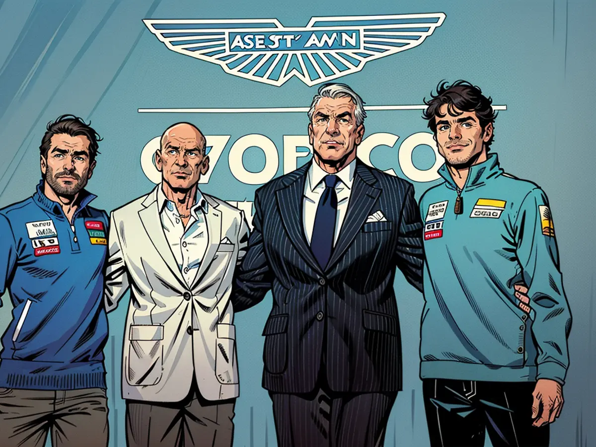 Fernando Alonso and Lance Stroll, joined by Aston Martin's newly appointed Managing Technical Partner, Adrian Newey, and Executive Chairman Lawrence Stroll, pose together.