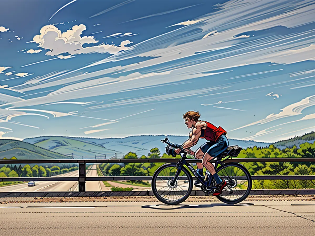 Wilcox, Lael traverses a bridge spanning Interstate 40 in Glorieta, New Mexico.