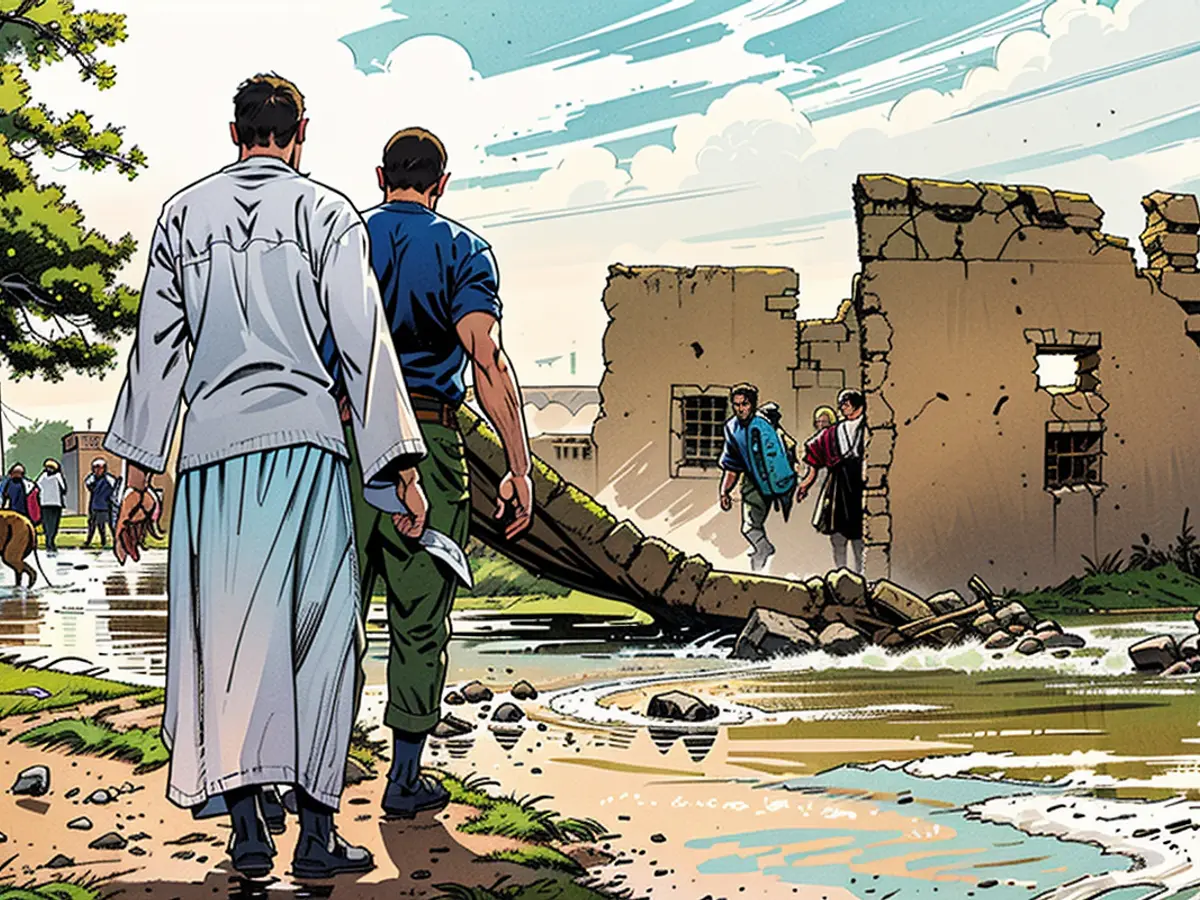 During the floods in the vicinity of Messawi, situated in Sudan's Northern State, close to Meroe, men dismantle a mudbrick house's wall to serve as an improvised dam on August 27, 2024.