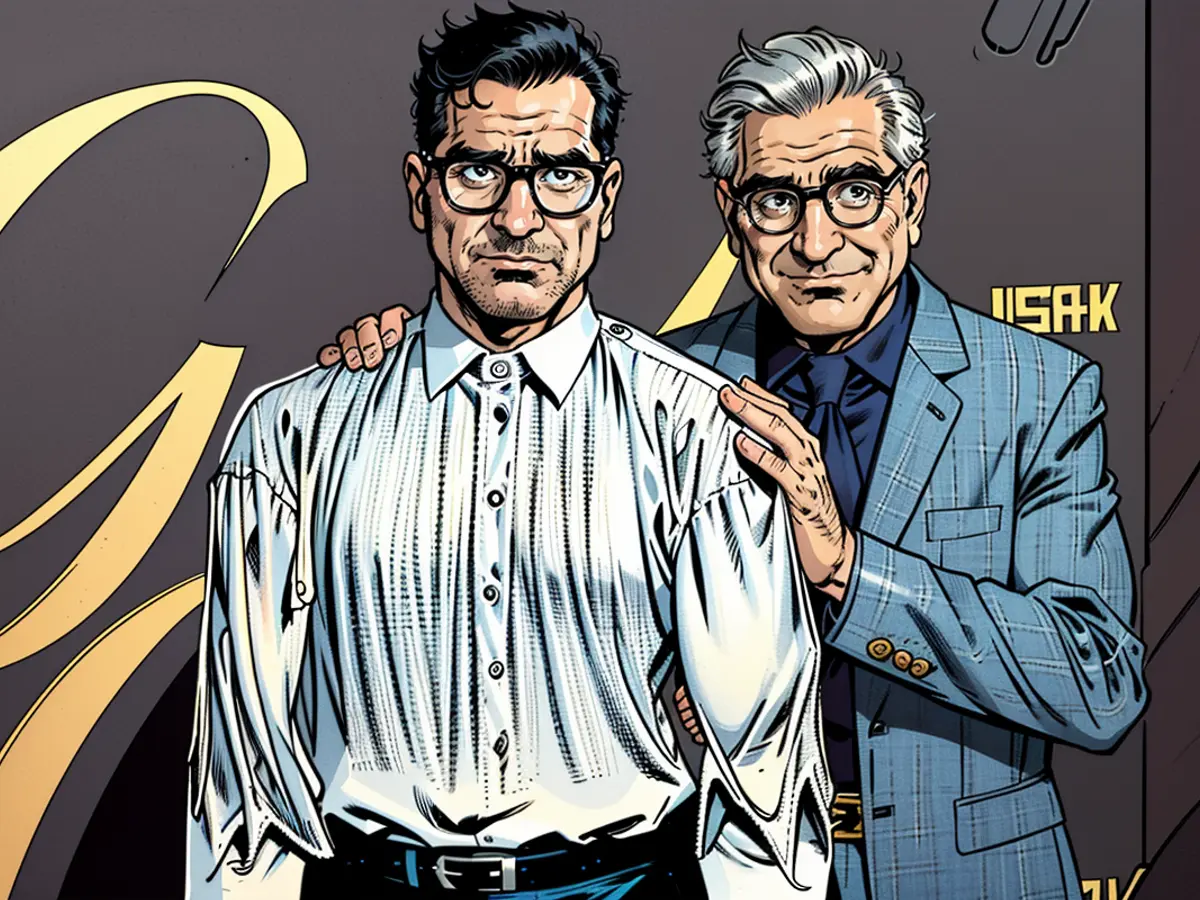 Dan Levy and Eugene Levy posed together in 2023.