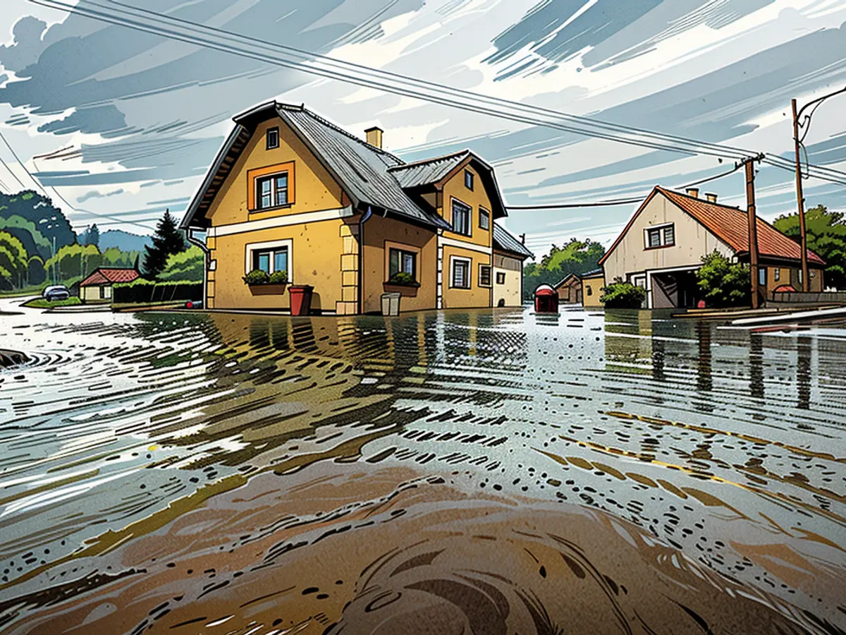 Au milieu de pluies torrentielles à Mikulovice, République tchèque, une habitation résidentielle succombe aux inondations.