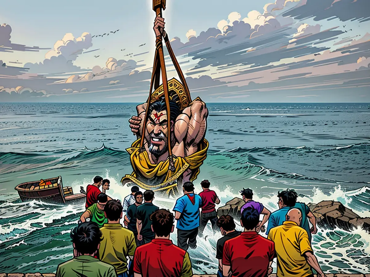 Worshippers employ a hoist to submerge a figure of the Hindu divinity Ganesh into the Bay of Bengal during the Ganesh Chaturthi celebration in Chennai on September 15, 2024.