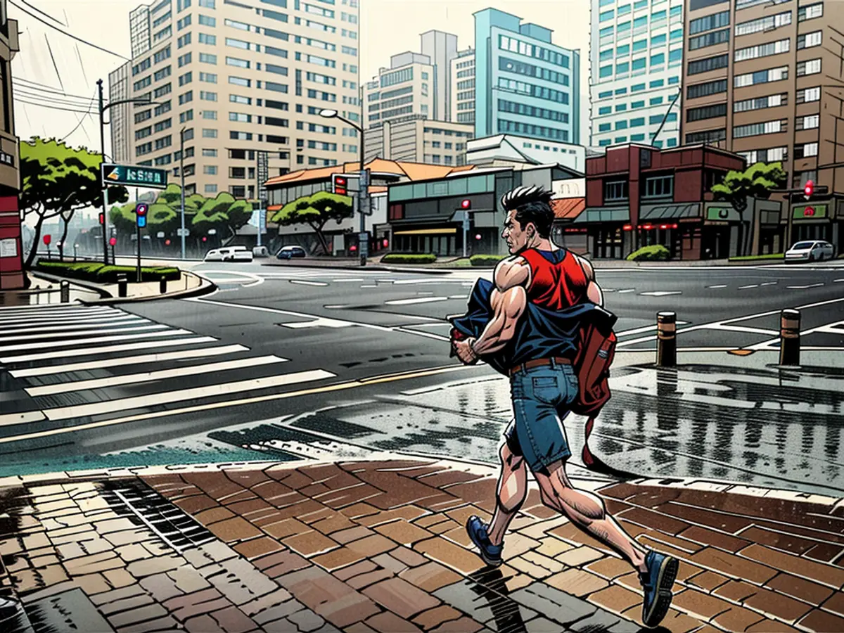 Amidst torrential rain and potent gusts, an individual sprints, as Typhoon Krathon hits the bustling seaport of Kaohsiung, located in Southern Taiwan, on October 3, 2024.