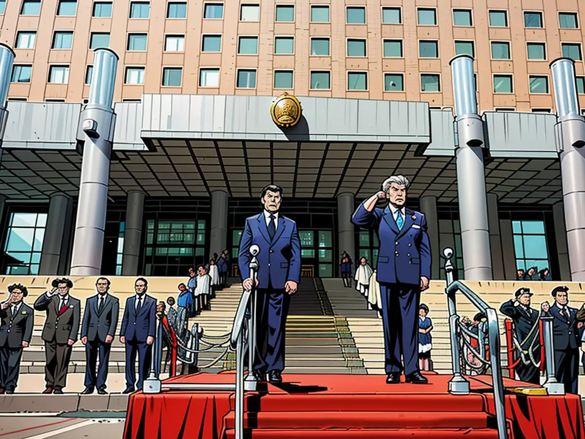 During a welcoming event in Beijing, Chinese Defense Minister Dong Jun interacts with his Russian counterpart, Andrei Belousov.