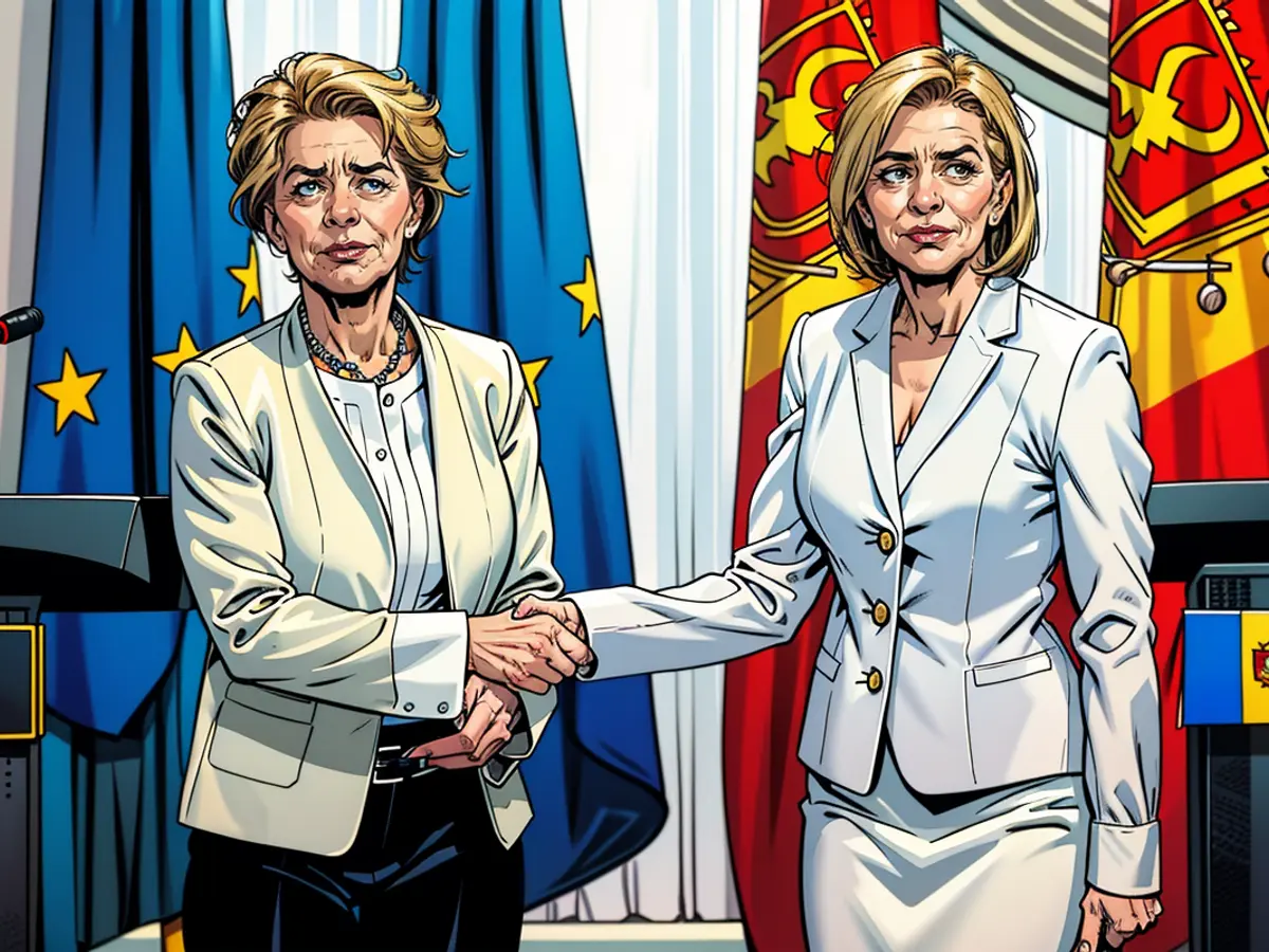 During a post-meeting press conference, European Commission President Ursula von der Leyen and Moldovan President Maia Sandu exchange handshakes at the Moldovan Presidency headquarters in Chisinau, which took place on October 10.