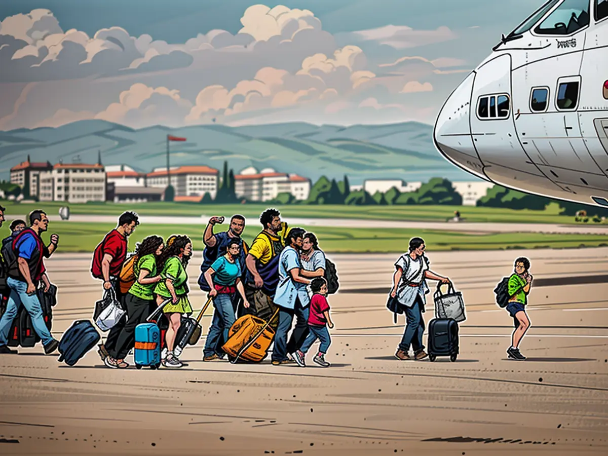 Individuals transition to another aircraft following an emergency landing of their Vistara Airlines flight from India to Germany at Erzurum Airport on September 7, 2024, due to a reported bomb scare.